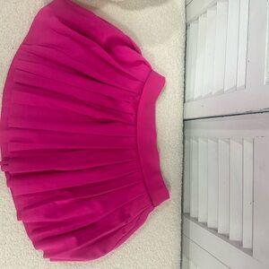 pink mini pleated skirt